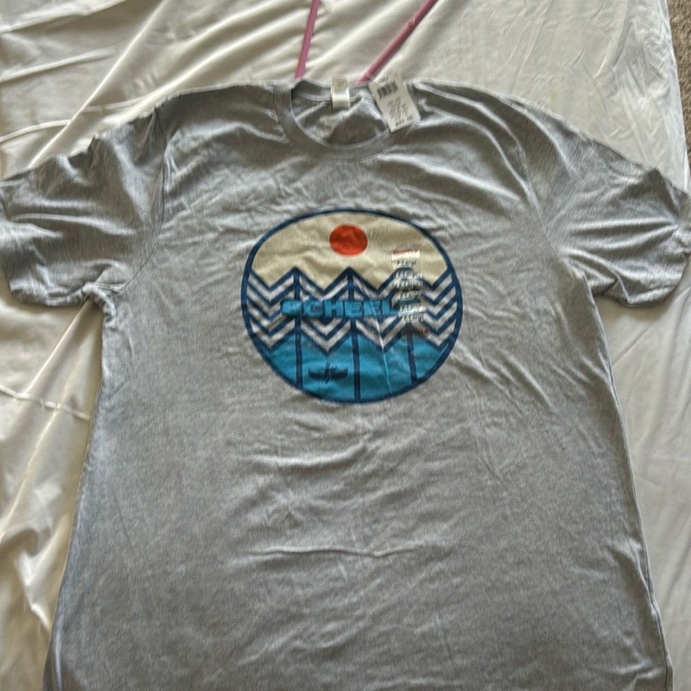 New with tags. Sheels t shirt. XL. Women’s